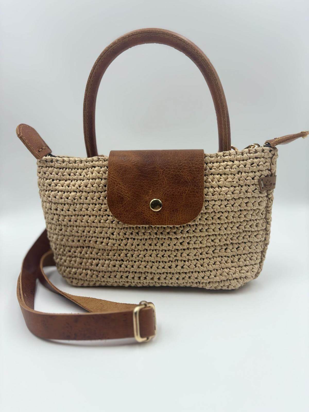Boho Terra bohem çanta, doğal dokusu ve özgün tasarımıyla modern şıklık sunar.