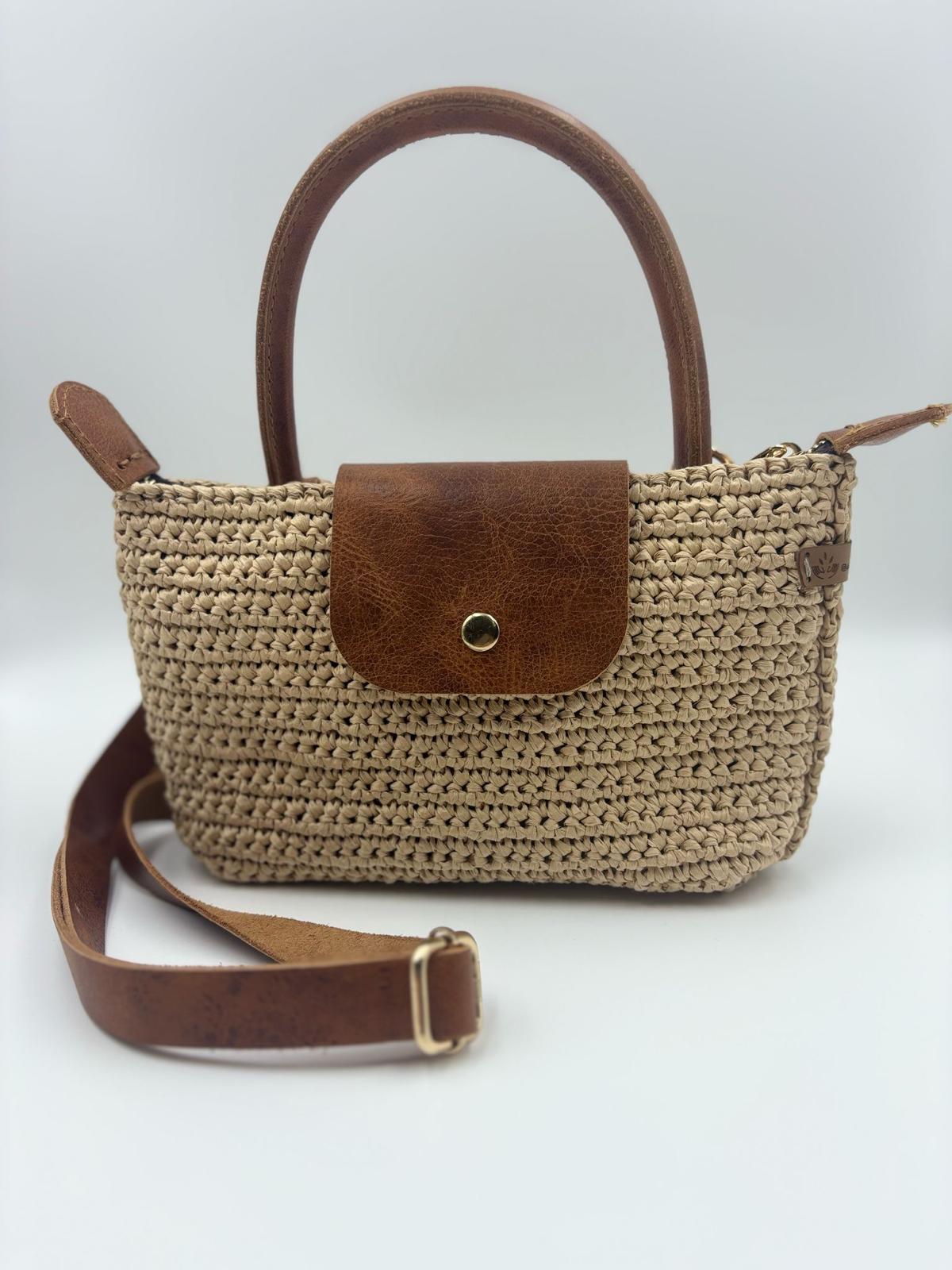 Boho Terra bohem çanta, doğal dokusu ve özgün tasarımıyla modern şıklık sunar.